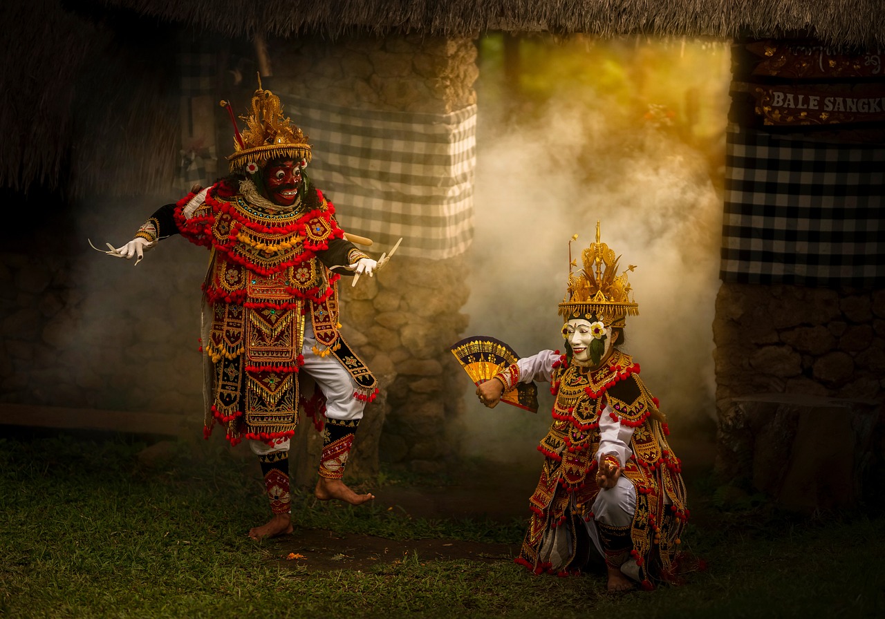 An elegant traditional Balinese dance performance, with dancers wearing ornate costumes and intricate headdresses, showcasing graceful movements and expressions that reflect the rich cultural heritage of Bali.